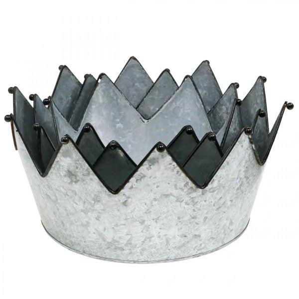 Dekorative Pflanzschale in Kronenform aus Metall.