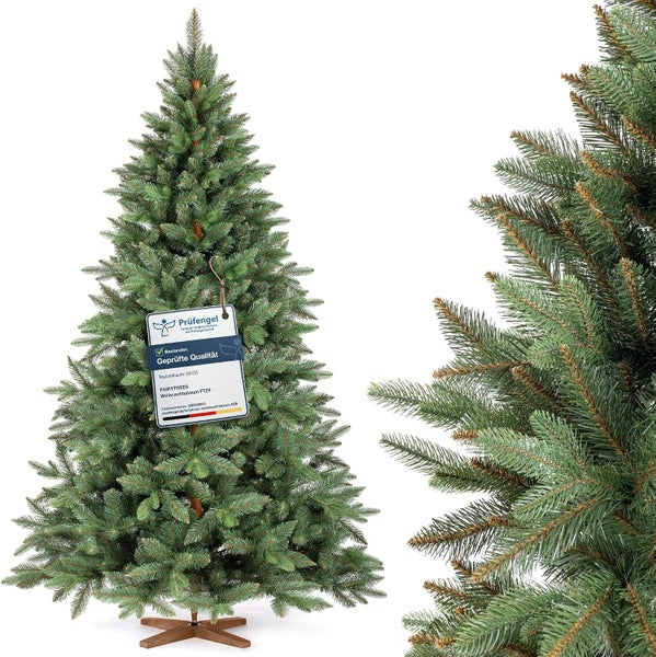 Künstlicher Weihnachtsbaum Fairytrees mit Prüfengel Qualitätssiegel auf einem Holzständer stehend