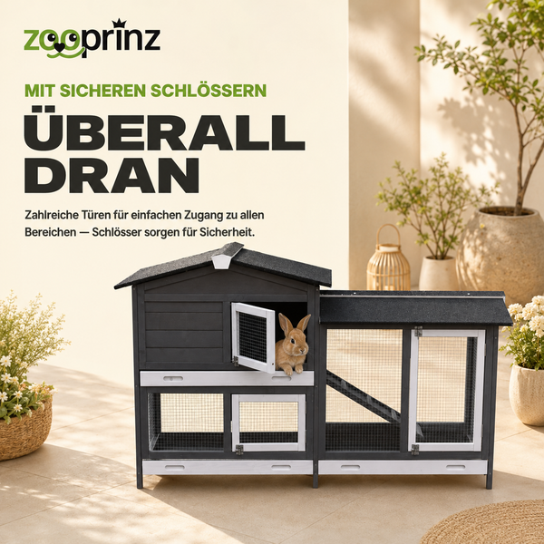 Zooprinz Kleintierstall aus Holz mit Freilaufgehege, zwei Etagen, mehreren Türen mit Schlössern und Rampe, in Anthrazit und Weiß.