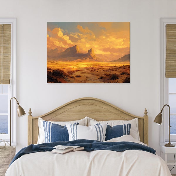 Schlafzimmer mit Bett und Wandbild einer Wüstenlandschaft bei Sonnenuntergang.