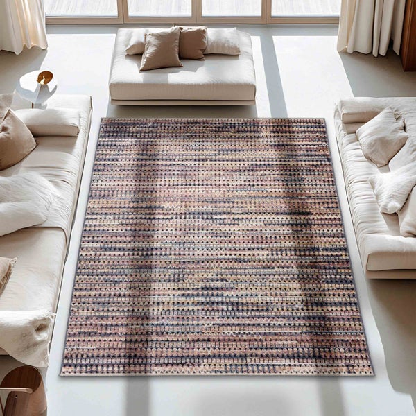 Dekorativer Teppich im Wohnzimmer mit modernem Design und geometrischen Mustern.