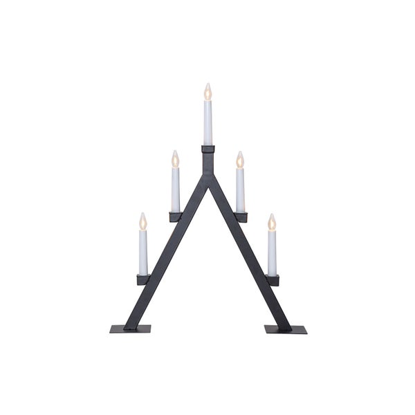 Schwarzer Kerzenleuchter mit elf Kerzen auf einem Tisch mit Dekoration