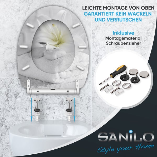 Sanilo Toilettendeckel mit Lilien-Motiv, einfache Montage von oben, inklusive Befestigungsmaterial und Schraubendreher. Sanilo Logo.