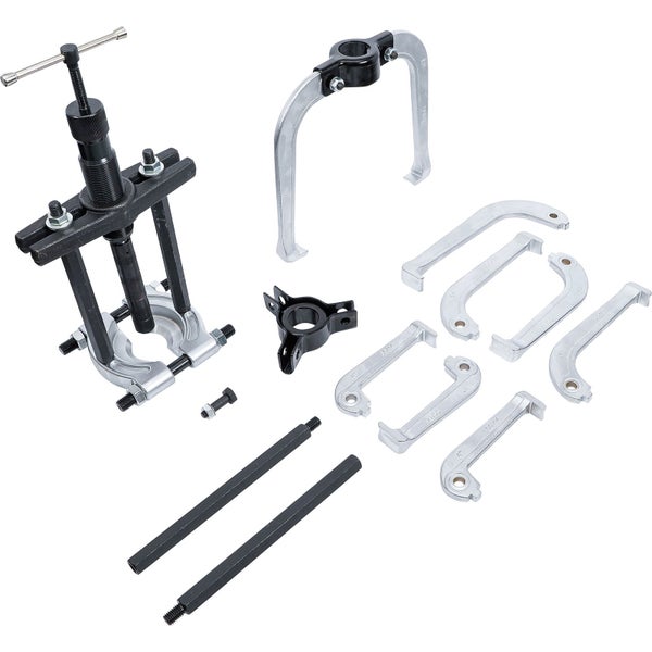 Werkzeugsatz in einem blauen Kunststoffkoffer mit verschiedenen Werkzeugen wie Abziehern und Schraubenschlüsseln