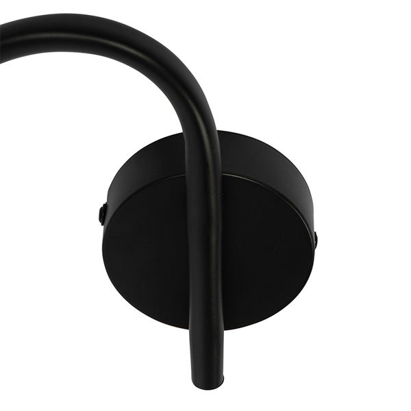 Detailansicht einer schwarzen Wandleuchte