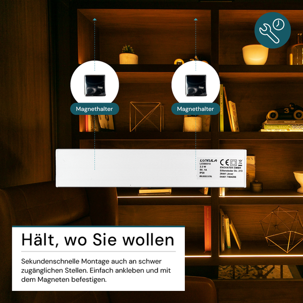 Luxula Lampe mit Magnetbefestigung vor Bücherregal