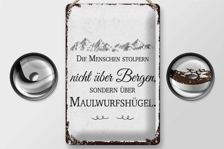 Blechschild Spruch Menschen stolpern nicht über Bergen 20x30cm