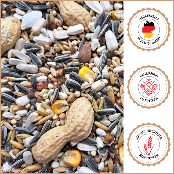 Vogelfutter mit Erdnüssen, Sonnenblumenkernen und Getreide sowie Siegel für Herstellung in Deutschland, Fütterung ganzjährig und aus hochwertigen Rohstoffen.
