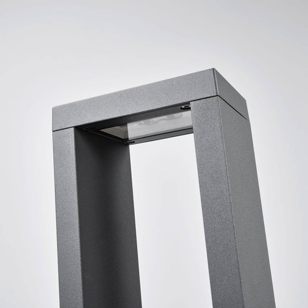 Moderne rechteckige Sockelleuchte aus anthrazitfarbenem Metall für den Außenbereich.