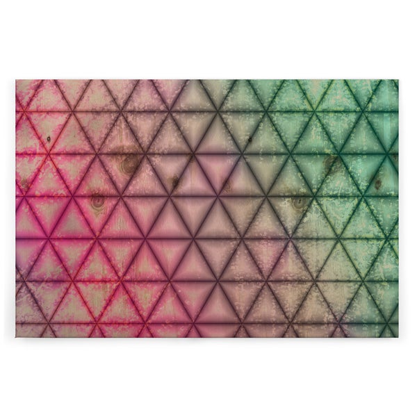 Wandbild mit geometrischem Dreiecksmuster auf Holzstruktur im Verlauf von Rosa nach Grün