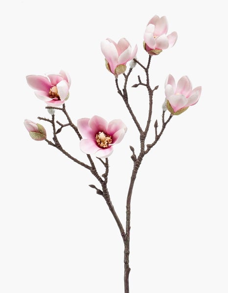Künstliche Magnolienblüte in Rosa und Weiß an einem braunen Zweig.