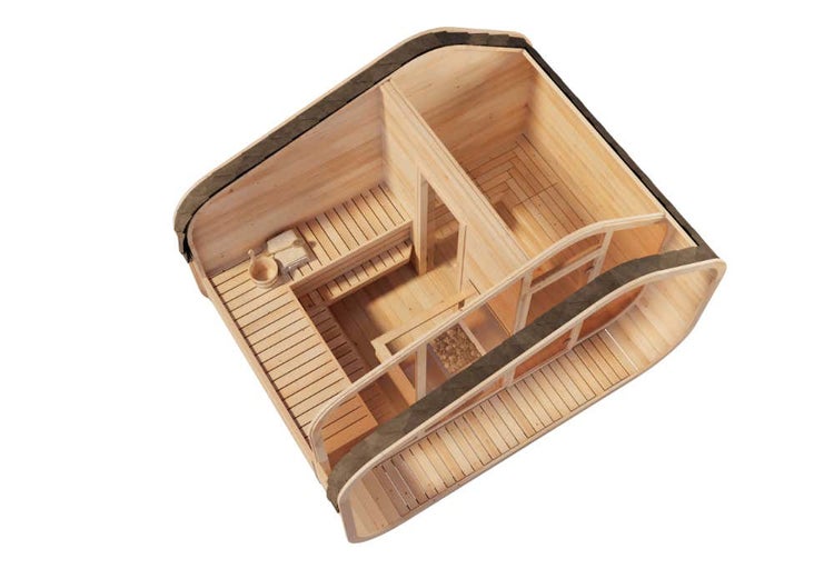 Eine Person schneidet mit einer Bosch Professional Stichsäge ein Holzbrett auf einem blauen Werkzeugkoffer in einem hellen Raum.