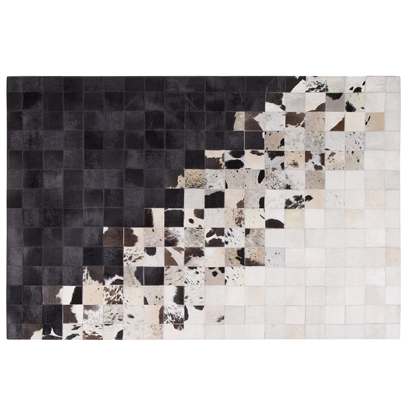 Rechteckiger Teppich aus Kuhfell in Patchwork Optik mit quadratischen Stücken und fließendem Muster