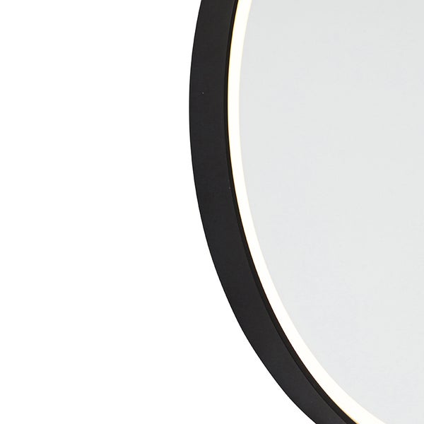 Detailaufnahme eines runden Spiegels mit Beleuchtung