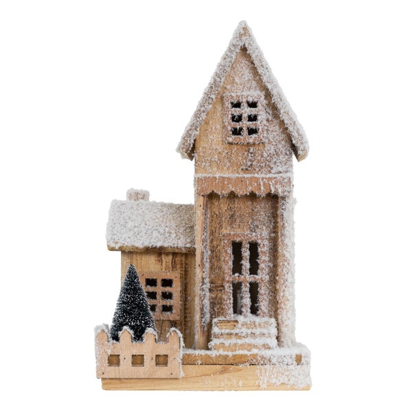 Dekoratives Holzhaus mit Schnee