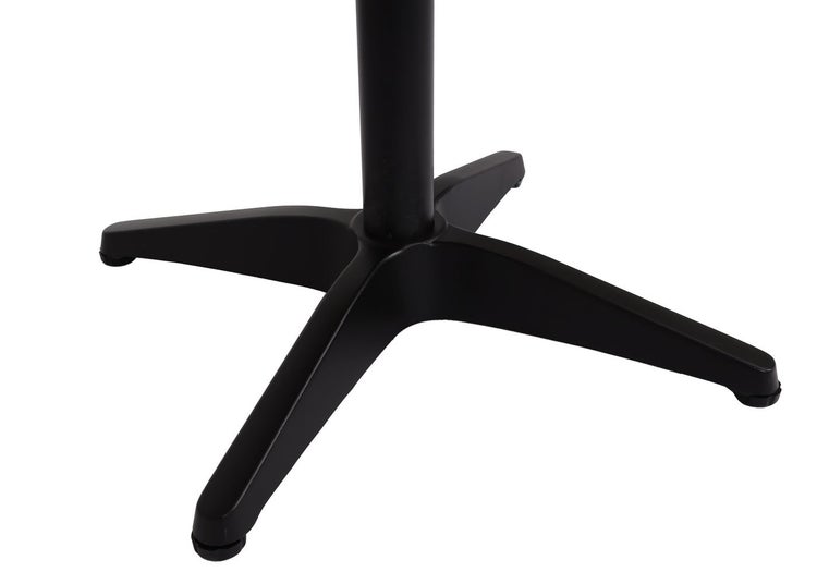 Detailansicht des schwarzen Metallfußes eines Tisches