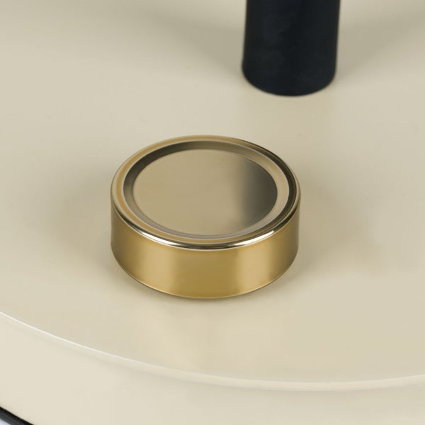 Runder goldfarbener Möbelknopf