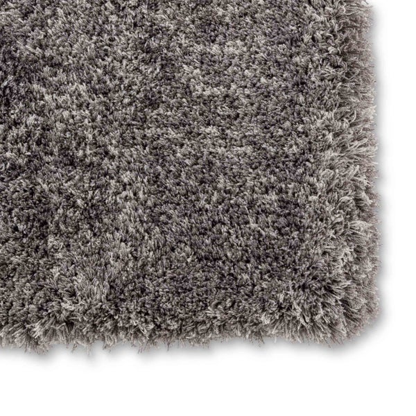Hochflor-Teppich Shaggy in Grau, Detailansicht der weichen Faserstruktur.