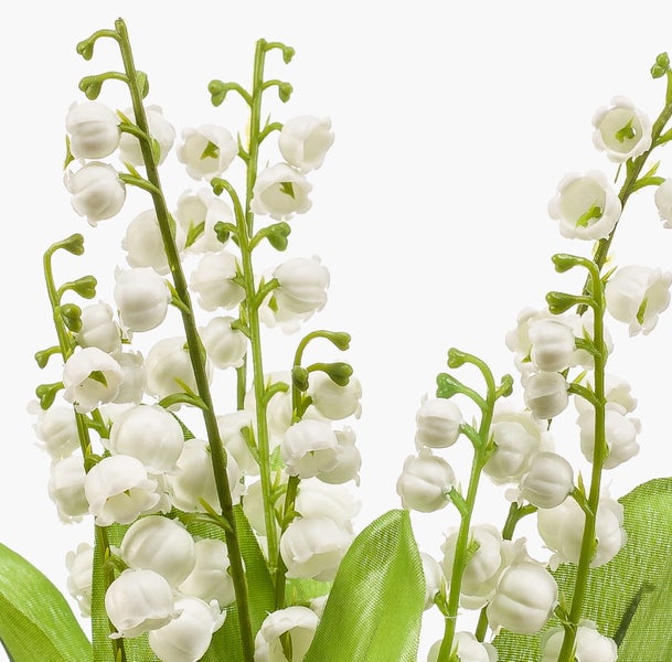 Künstliche Maiglöckchen mit weißen glockenförmigen Blüten und grünen Stielen.