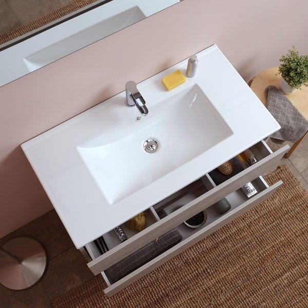 Badezimmer Waschbeckenunterschrank mit offen Schubladen und diversen Badutensilien