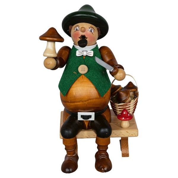 Räuchermann Pilzsammler aus Holz mit Pilzkorb und Messer, traditionelle erzgebirgische Holzkunst für die Weihnachtsdekoration.