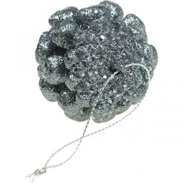 Glitzernder Tannenzapfen mit Aufhängevorrichtung