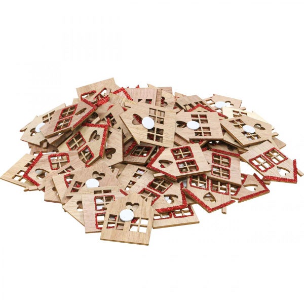 Holzhäuser mit rotem Glitzer zur Dekoration