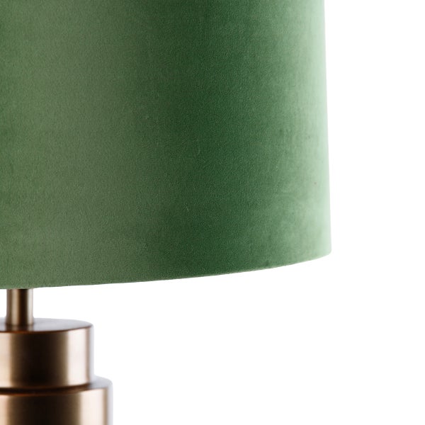 Detailaufnahme einer Tischleuchte mit Lampenschirm aus Stoff