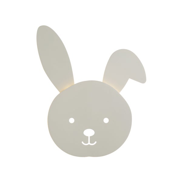 Kinder-Wandleuchte in Hasenform, cremefarben, mit einem geknickten Ohr und Ausschnitten für Augen und Mund.