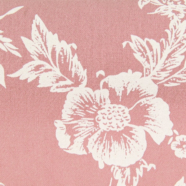 Nahaufnahme von Stoff mit Blumenmuster und Leinenstruktur.