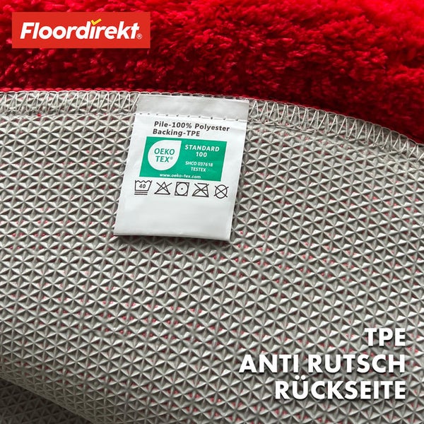 Detailansicht der Anti-Rutsch-Rückseite und des Etiketts eines Teppichs mit Öko-Tex Standard 100 Siegel