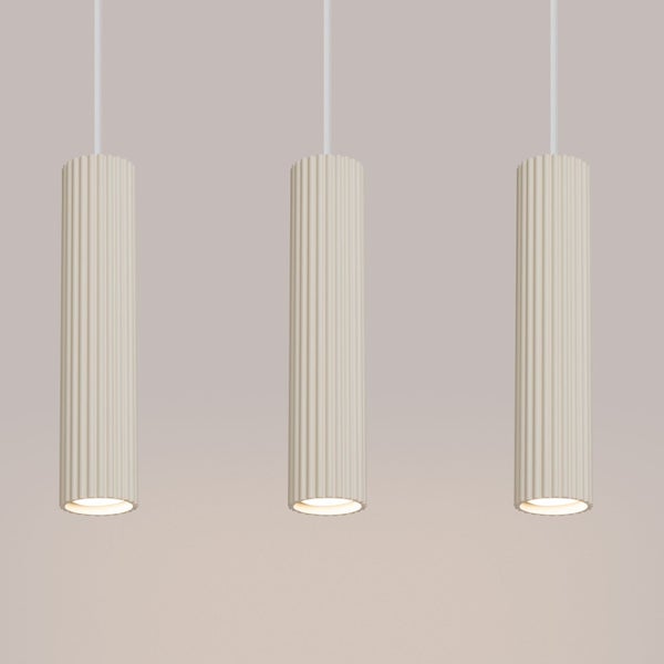 Drei zylinderförmige Pendelleuchten mit gerippter Oberfläche