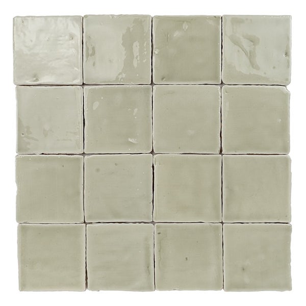 Quadratische Wandfliesen mit glänzender, strukturierter Oberfläche in einem Set von sechzehn Stück.