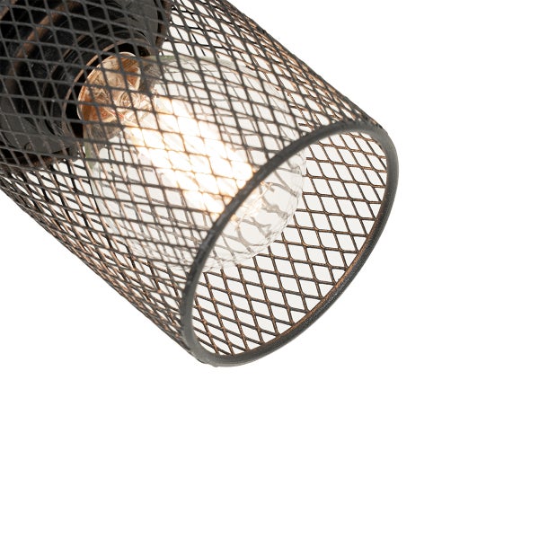 Detailaufnahme einer schwarzen Gitterlampe mit Glühbirne