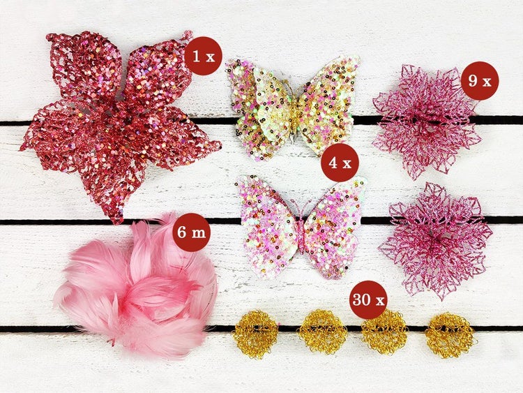 Set mit dekorativen Weihnachtselementen wie glitzernden Blumen, Schmetterlingen, Federornamenten und Drahtkugeln zur festlichen Dekoration.