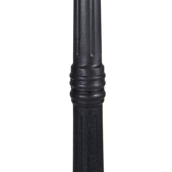 Detailansicht eines schwarzen, geriffelten Leuchtenmastes mit dekorativem Mittelstück.