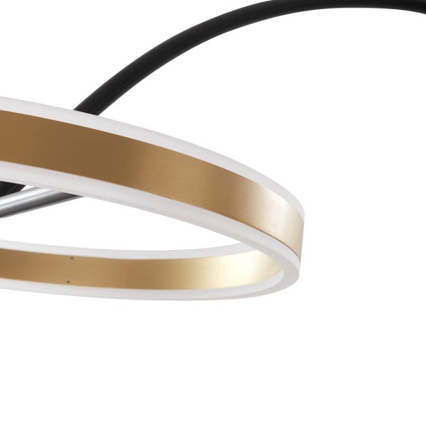 Nahaufnahme eines Lampenrings mit goldfarbenem Finish, weißem Diffusor und schwarzem Arm.