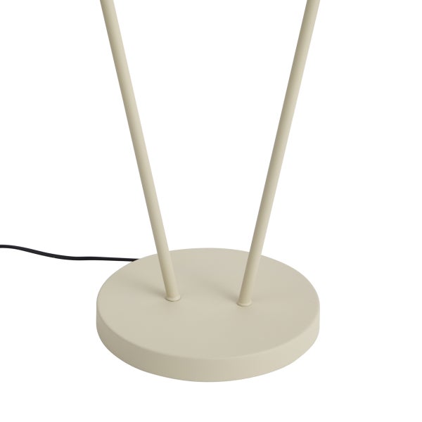 Runder Lampenfuß in Beige mit zwei schmalen Stangen und schwarzem Stromkabel.