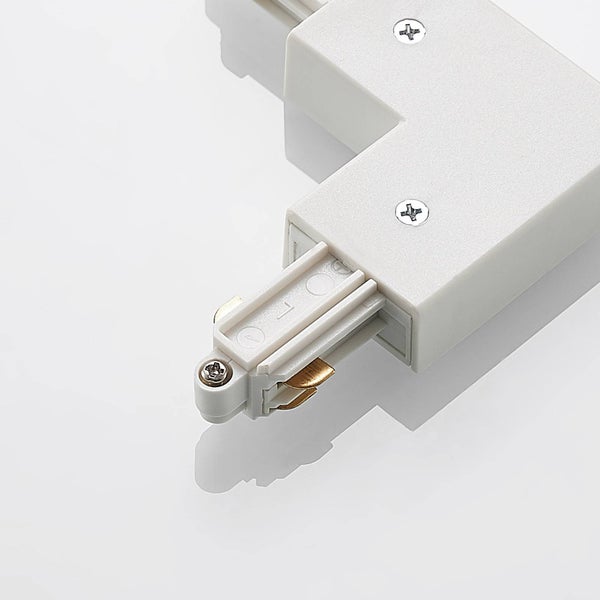 Verbinder in L-Form für Schienensystem aus weißem Kunststoff mit sichtbaren Kontakten und Schrauben.