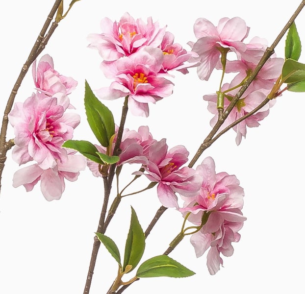Künstlicher Kirschblütenzweig mit rosafarbenen Blüten und grünen Blättern