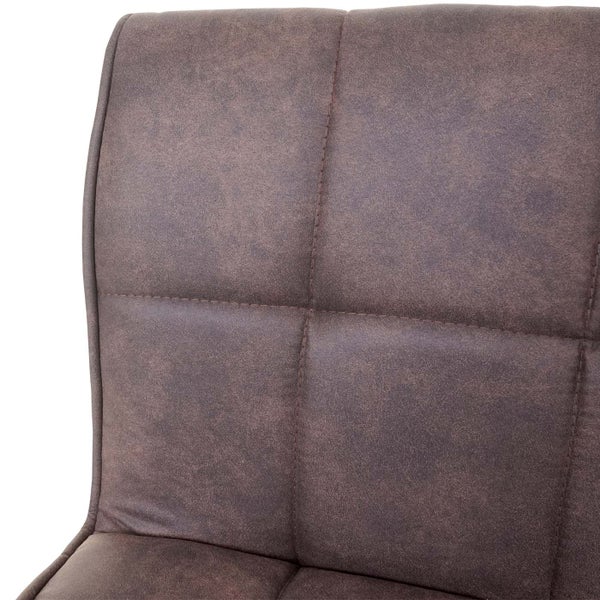 Detailansicht der gesteppten Rückenlehne eines Stuhls