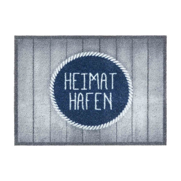 Fußmatte mit dem Schriftzug Heimat Hafen und einem Seilkreis