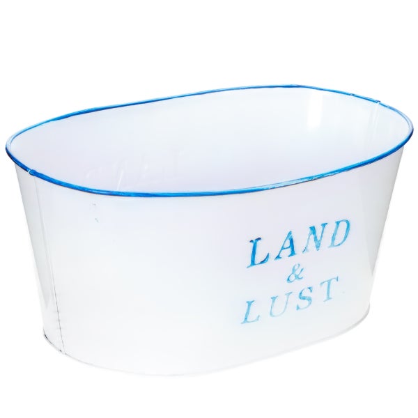 Ovaler Übertopf aus Metall in Weiß mit blauem Rand und dem Schriftzug Land und Lust.
