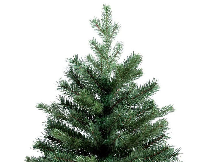 Die Spitze eines künstlichen Weihnachtsbaums mit detaillierten Nadeln für eine festliche Dekoration.