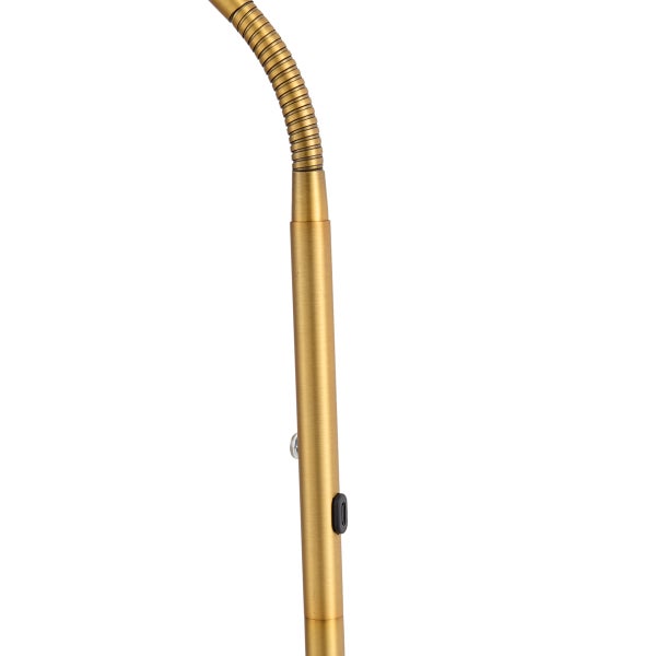 Detailansicht einer messingfarbenen Leuchte mit flexiblem Schwanenhals und einem schwarzen Schalter am geraden Stab.
