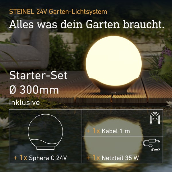 Steinel 24V Garten-Lichtsystem Starter-Set mit Sphera C Kugelleuchte 300 Millimeter Durchmesser, 1 Meter Kabel und 35 Watt Netzteil auf Terrasse.