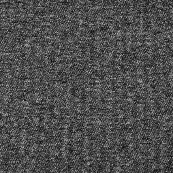 Dekorative Szene mit einer Tischleuchte mit gelbem Schirm auf einer Kommode vor einer gemusterten Tapete.