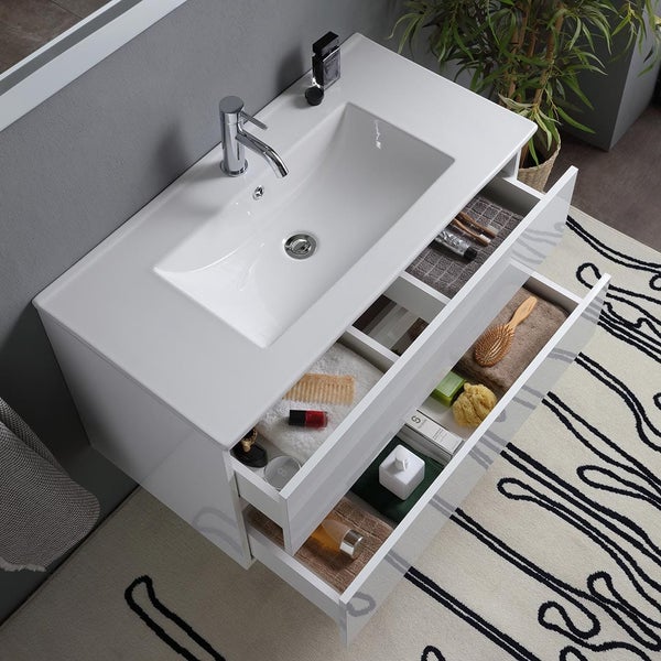 Badezimmerwaschtisch mit offenem Schubladensystem, Waschbecken und Armatur.