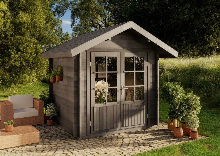 Garten Szene mit Holzgartenhaus, Sitzgruppe und Pflanzen