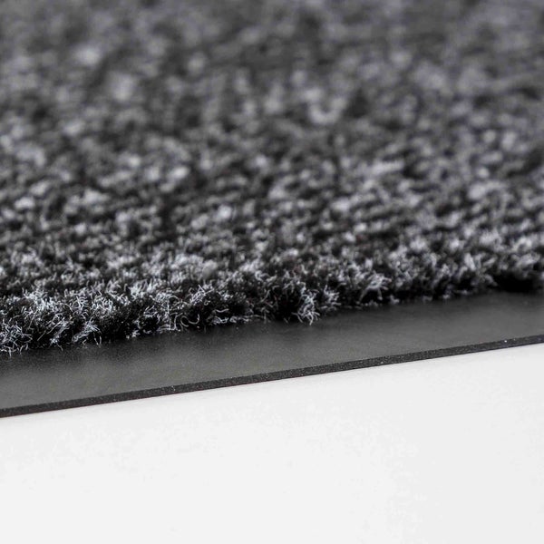 Detailansicht einer Schmutzfangmatte mit Textiloberfläche und Gummirand